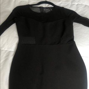 Black dress. With mesh sleeves